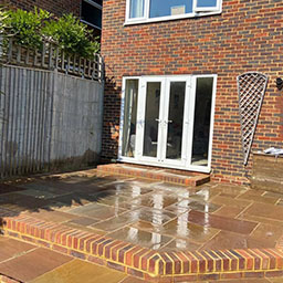 patio in a garden with a step down 